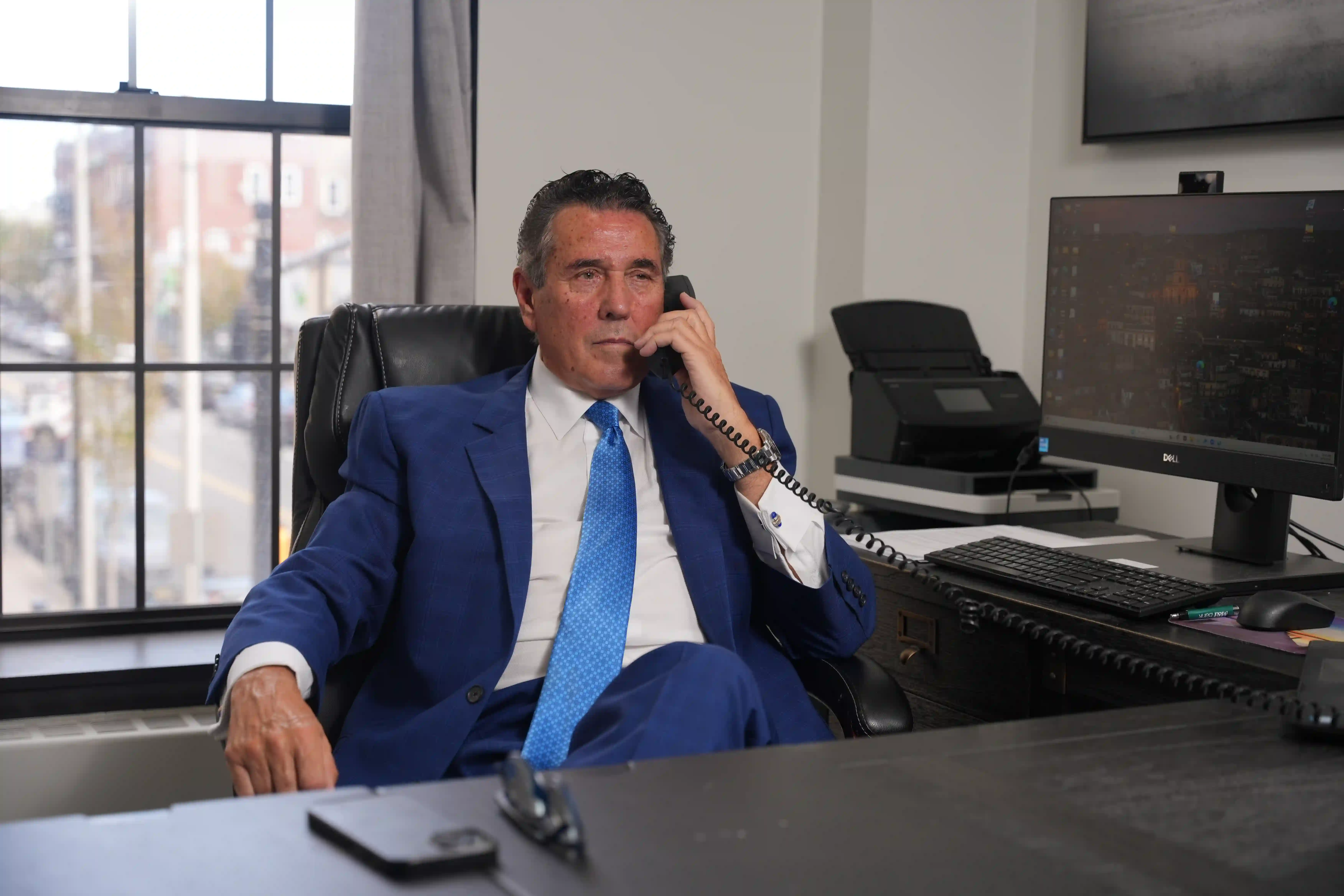 Paul Faugno, Trial Attorney at Faugno Weis Duarte Raso, LLC, on a phone call at his desk in Hackensack, NJ